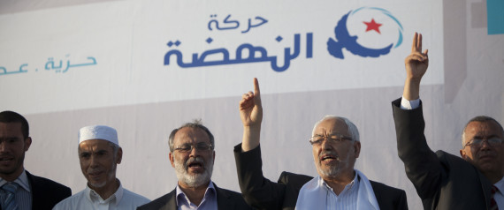 Rached Ghannouchi, leader of islamist party Ennahda (second/right), Sadok Chourou (co-founder of Ennahdha, second left), Abou Yaareb Marzouki, candidate for the Constituent Assembly (middle), during a rally of Ennahda